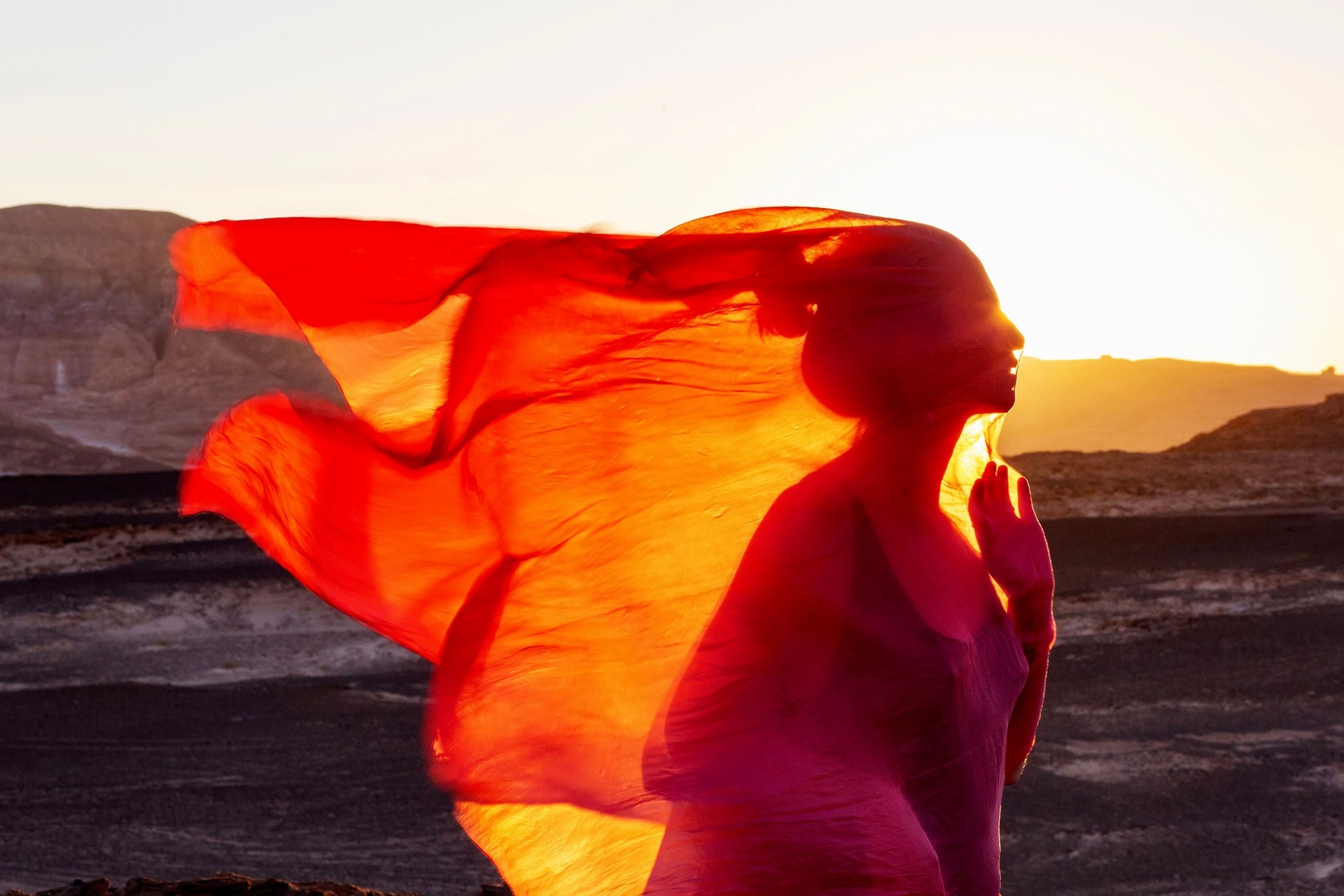 Beautiful woman resting in the desert